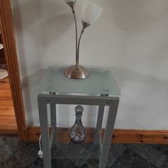 table with table lamp and vase