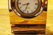 Quartz clock in steel housing