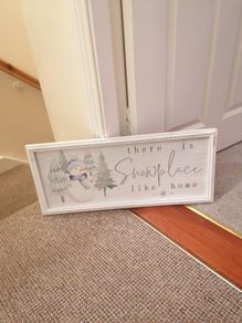 Snowplace like home sign