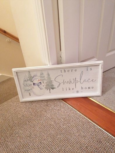 Snowplace like home sign