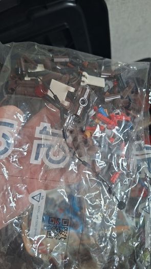 Large box of lego , accessories and weapons