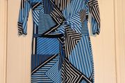 Stunning unique design midi dress with rouched front detail.