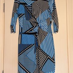 Stunning unique design midi dress with rouched front detail.