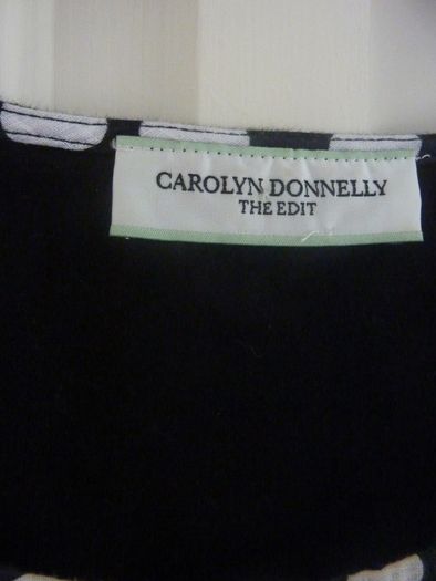 Carolyn Donnelly  polka dot top PENDING
