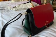 Beautiful handbag with a beautiful colour scheme of black, red and green with adjustable and removable shoulder strap