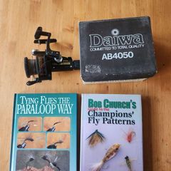 Fly Tying  Books X 2. Plus A Daiwa Ab4050  Spinning Reel. Bob Churche's Guide To The Champions Fly Patterns. 1 X Tying Flies The Paraloop Way By Ian Moutter. Both Books First Edition Hardbacks One With Dustjacket In Good Condition .