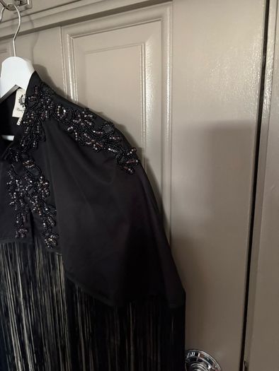 Heavily embellished limited edition exaggerated fringe cape cult piece