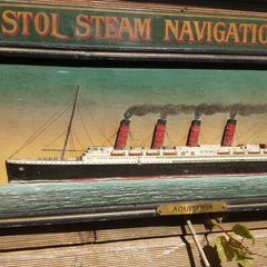 Aquitania Hand Painted Carved Sign