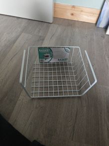 Hanging basket for kitchen storage