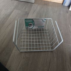 Hanging basket for kitchen storage
