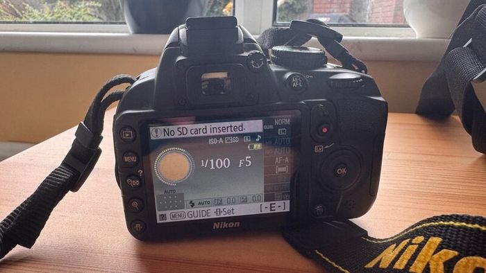 Nikon D3100 DSLR w/ 18-55mm VR Lens + Accessories