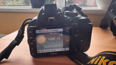 Nikon D3100 DSLR w/ 18-55mm VR Lens + Accessories