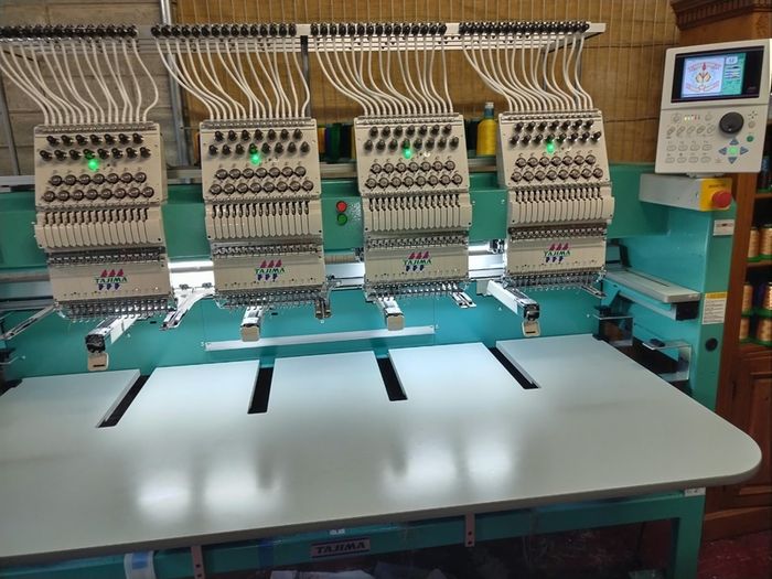 two tajima tfmx 4 head embroidery machines
