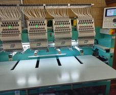 two tajima tfmx 4 head embroidery machines