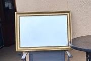 Old gold framed bevelled mirror