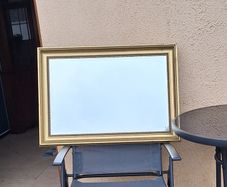 Old gold framed bevelled mirror