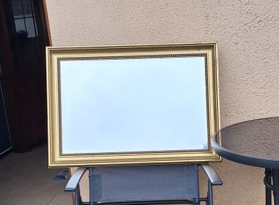 Old gold framed bevelled mirror