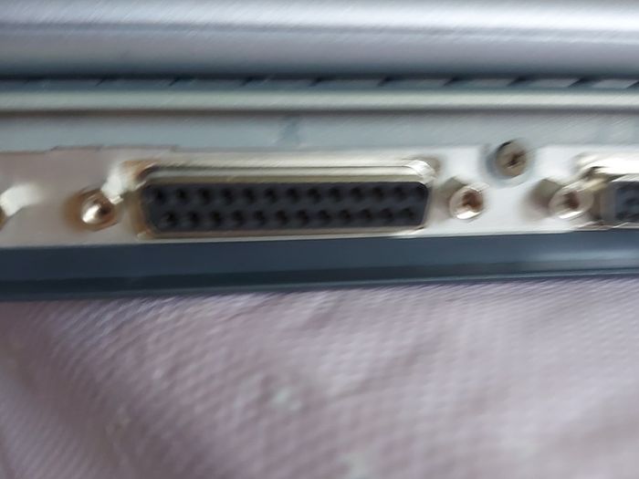 Rare Vintage Fujitsu Siemens Lifebook, E Series, FPC07048B Part number CP127259, Running Windows 2000 Professional, uses 3.5 floppy disk, 20GB HDD, amd all the connecting Ports from 30 years ago Era