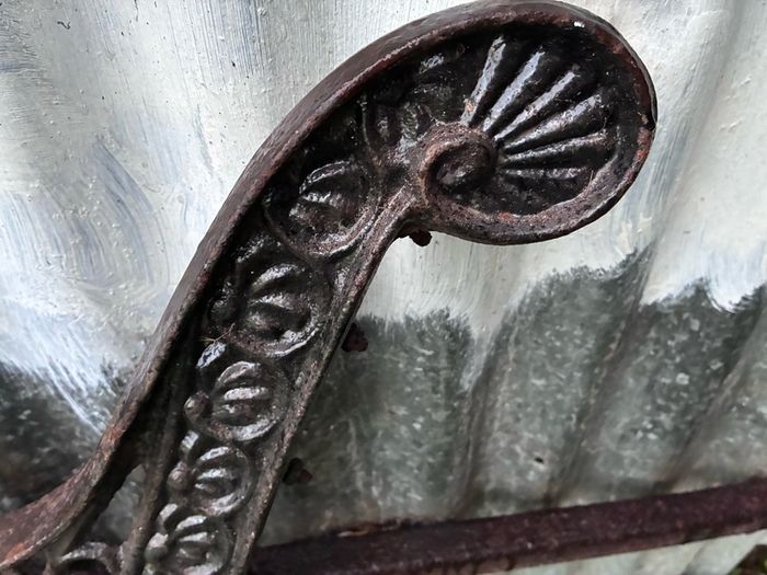 Pair of decorative cast iron bench ends