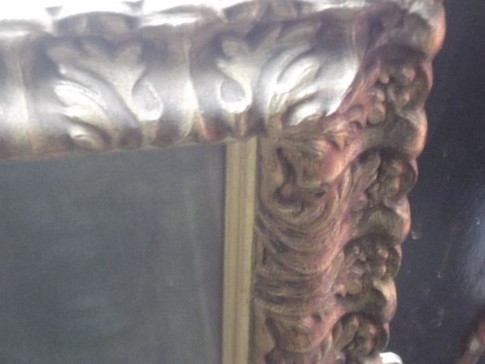 a large vintage holy picture in a lovely gild  frame
