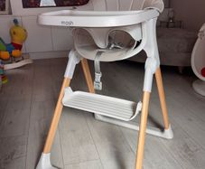 Mash high chair with changeable baby seat.