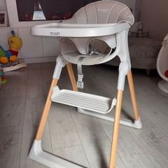 Mash high chair with changeable baby seat.