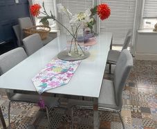 beautiful glass table and 6 chairs