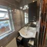 Bathroom Sink and Cabinet Image 4