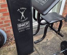 weights barbell dumbells bench