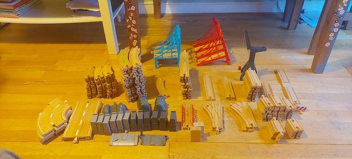 Large collection of toy train track (wood & plastic)