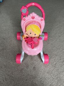 Fisher price walker with doll