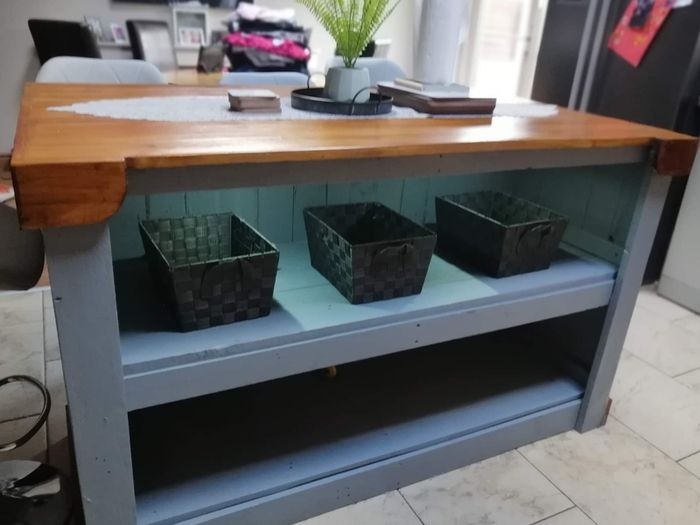 Rustic kitchen island with overhang