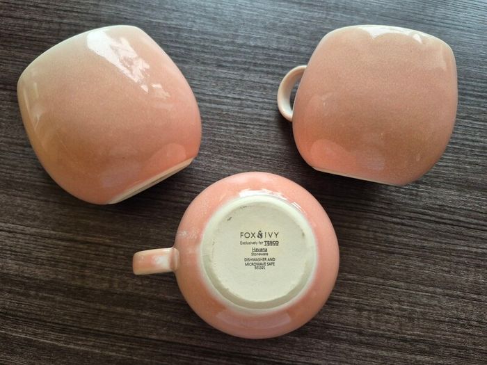 three round pink cups