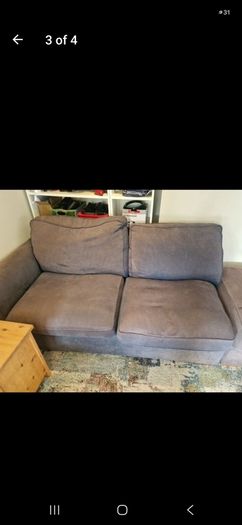 free sofa and large pouffe