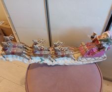 Long santa in sleigh christmas decoration
