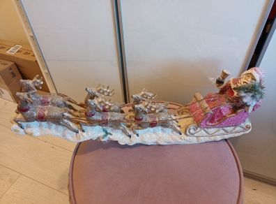 Long santa in sleigh christmas decoration