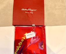 100% silk scarf by Salvatore Ferragamo. Brand new with original box and tags attached.