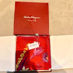 100% silk scarf by Salvatore Ferragamo. Brand new with original box and tags attached.