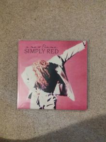 Simply Red A new flame lp mint Irish press