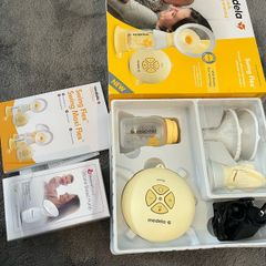 Medela Swing Flex Single Electric Breast Pump, Compact and Portable Design, with PersonalFit Flex Cups and Medela 2-Phase Expression Technology