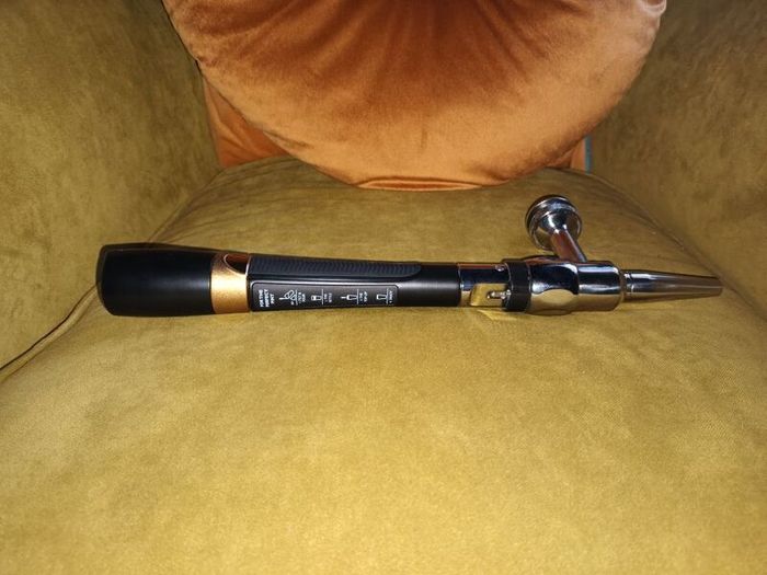 Guinness tap with stainless steel creamer nozzle.
