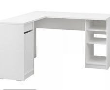 White corner desk with shelving