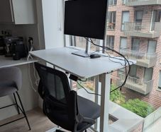 Electronic standing desk, monitor and chair