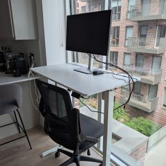 Electronic standing desk, monitor and chair