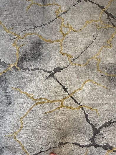 Marbled effect rug