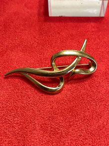Gold tone Brooch