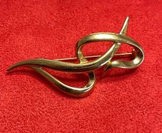 Gold tone Brooch