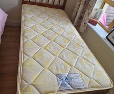 single bed and headboard