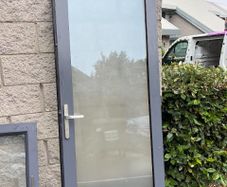 Grey Aluminium External Door with Frosted Double Glazing