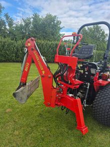 Backhoe digger for compact tractor.